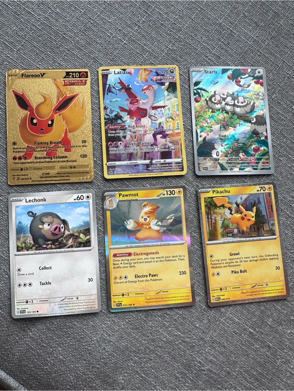 Pokemon Trading Card Lot - Gold Flareon V, Yellow Pikachu, Blue Latias